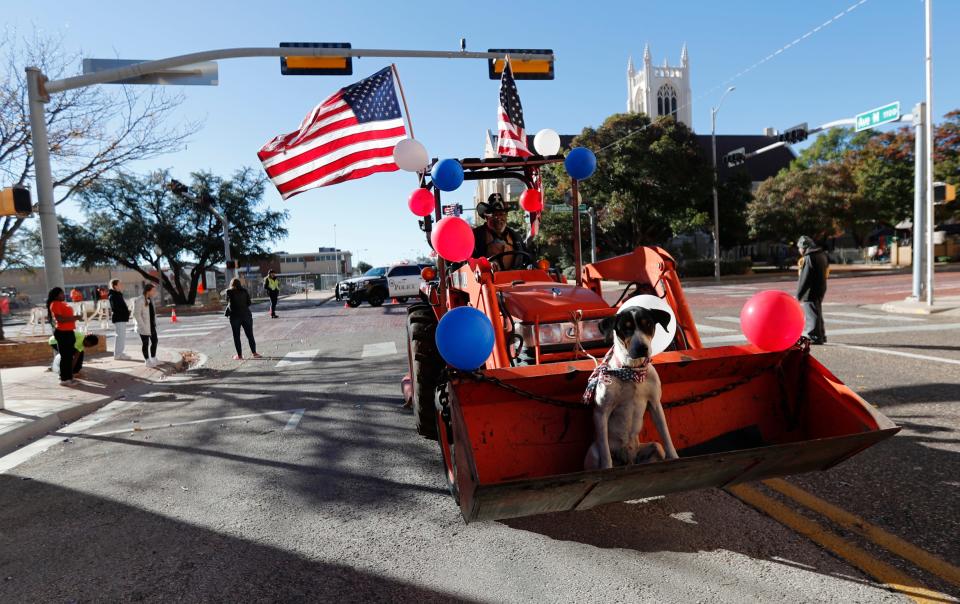 Billy Morrison drives in the parade with his dog, “Spottie” in the front. The 2022 Veterans Day Parade, honoring the military and those that served was held on Saturday morning November 5, 2022. The parade ran from Broadway to the Civic Center was organized by Los Hermanos Familia.