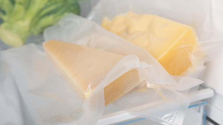 Different types of cheese in fridge