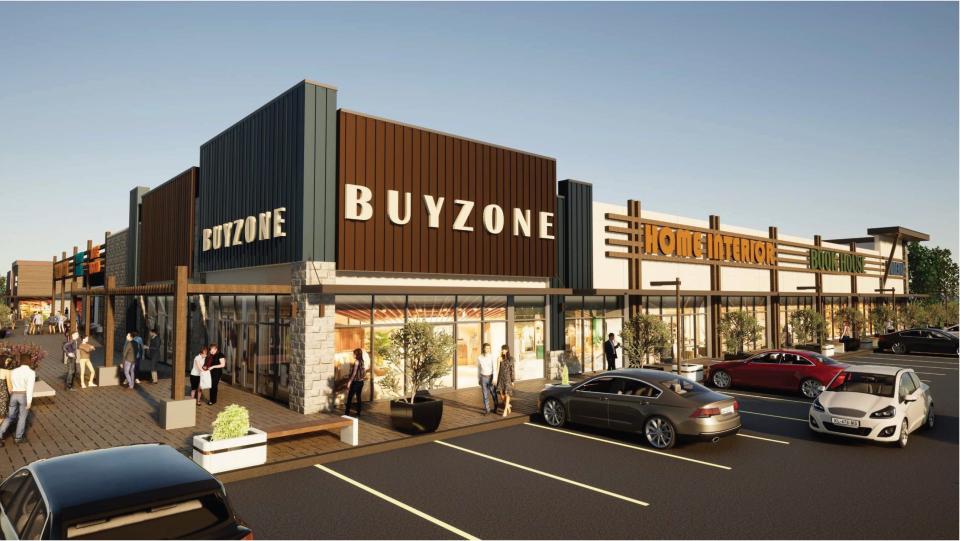 A rendering shows the design concept of one of the four buildings proposed in a redevelopment plan of the former movie theater and Applebee's at the Barn Plaza in Doylestown Township.