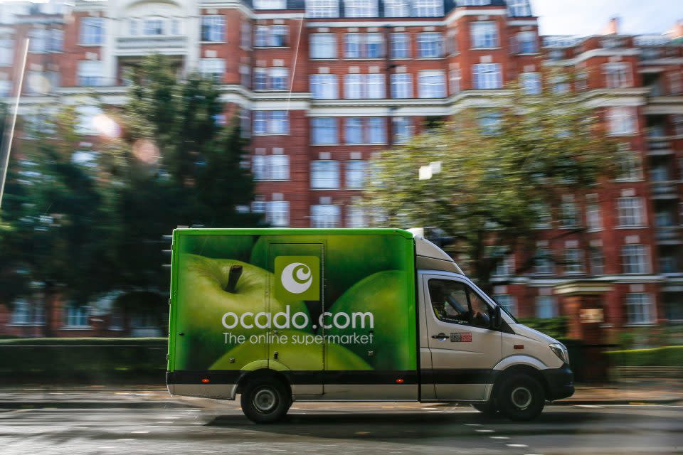 A delivery truck operated by Ocado Group Plc passes residential houses in the Maida Vale district of London, U.K., on Thursday, Oct. 8, 2020. Covid-19 lockdown enabled online and app-based grocery delivery service providers to make inroads with customers they had previously struggled to recruit, according the Consumer Radar report by BloombergNEF. Photographer: Hollie Adams/Bloomberg via Getty Images