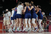 Serbia players jump up and down as they celebrate their win over China in a women's basketball quarterfinal game at the 2020 Summer Olympics, Wednesday, Aug. 4, 2021, in Saitama, Japan. (AP Photo/Eric Gay)