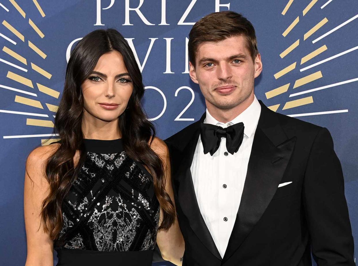 Max Verstappen of Red Bull Racing poses with Kelly Piquet during the FIA Prize Giving Ceremony on December 16, 2021 in Paris, France