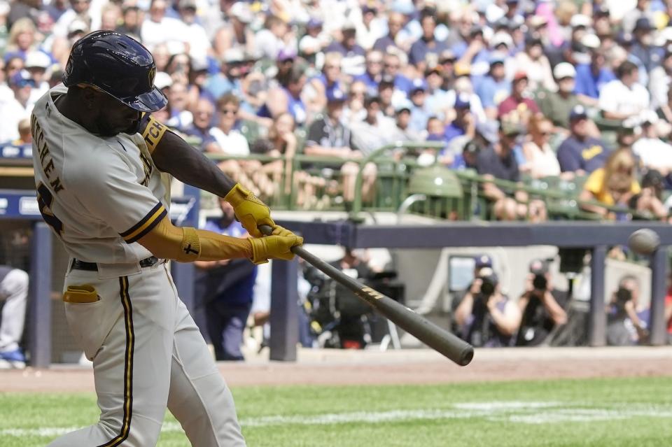 Milwaukee Brewers' Andrew McCutchen hits a two-run home run during the third inning of a baseball game against the Los Angeles Dodgers Thursday, Aug. 18, 2022, in Milwaukee. (AP Photo/Morry Gash)