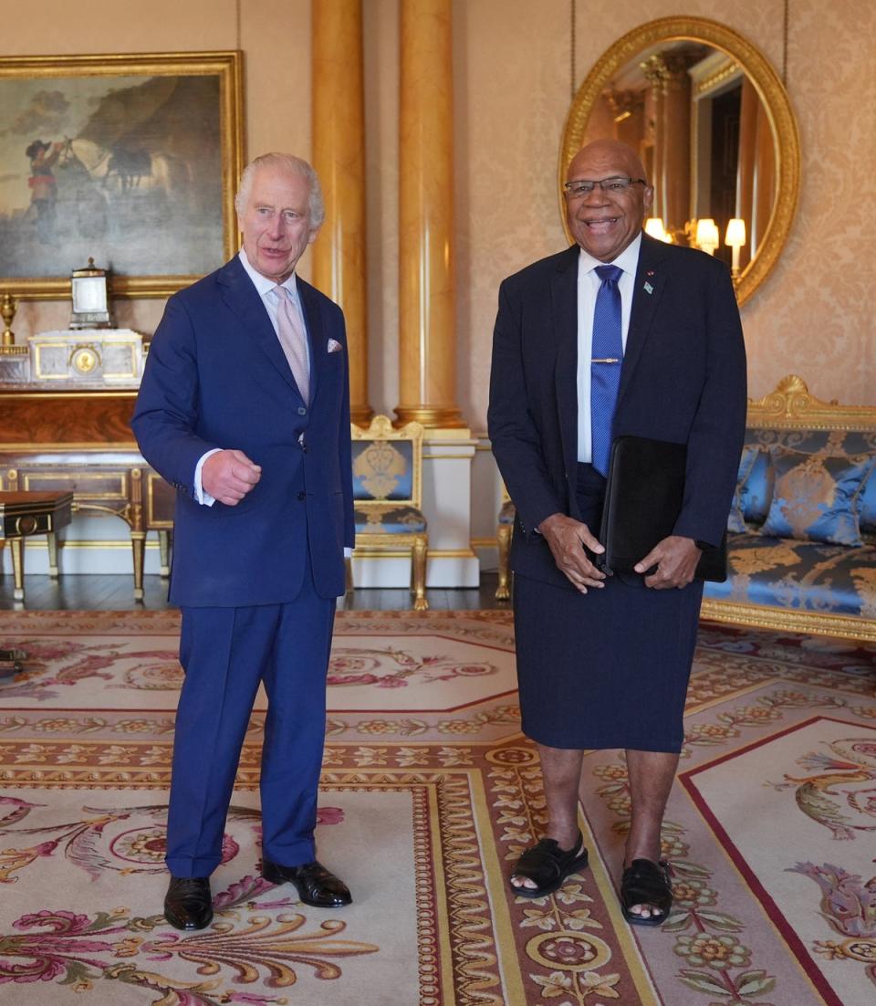 King Charles III greets Prime Minister of Fiji, Sitiveni Rabuka, during an audience at Buckingham Palace on May 7 (Getty Images)
