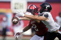 Cincinnati's Alec Pierce (12) tries to make a catch against Indiana's Reese Taylor (2) during the first half of an NCAA college football game, Saturday, Sept. 18, 2021, in Bloomington, Ind. (AP Photo/Darron Cummings)