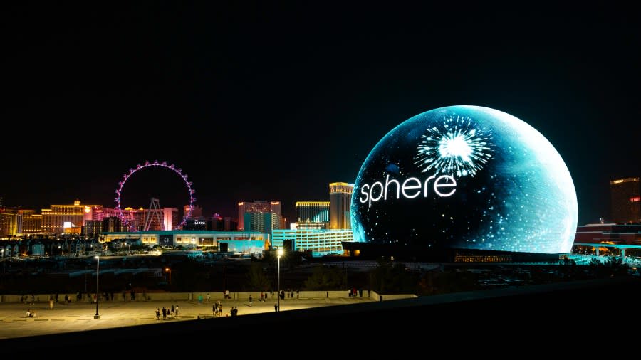 The world's largest spherical structure was officially lit for the first time Tuesday. The 580,000 square foot exterior was demonstrated, showing what the largest LED screen in the world can do, with patriotic July 4th fireworks, the planet Earth, and even an early Halloween jack-o'-lantern projected on the exosphere. | PHOTO: Justin Walker (KLAS)