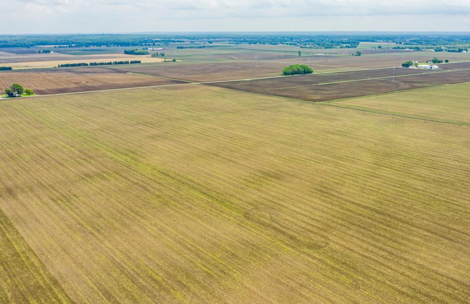 This aerial view shows the farmland where the Honeysuckle Solar Farm has begun site work near New Carlisle.