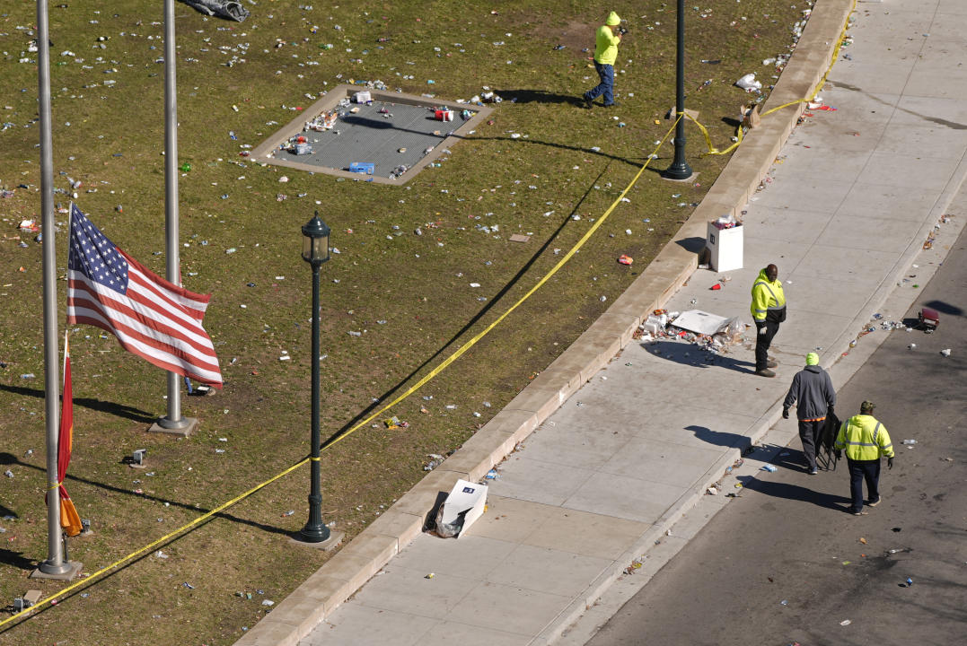 Workers clean outside of Union Station. (Charlie Riedel/AP)