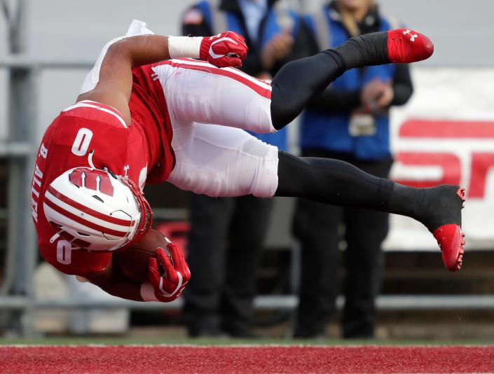 Wisconsin Badgers running back Braelon Allen (0) scores  a 71-yard touchdown run in the first quarter against Nebraska during their football game Saturday, November 20, 2021, at Camp Randall in Madison, Wis.