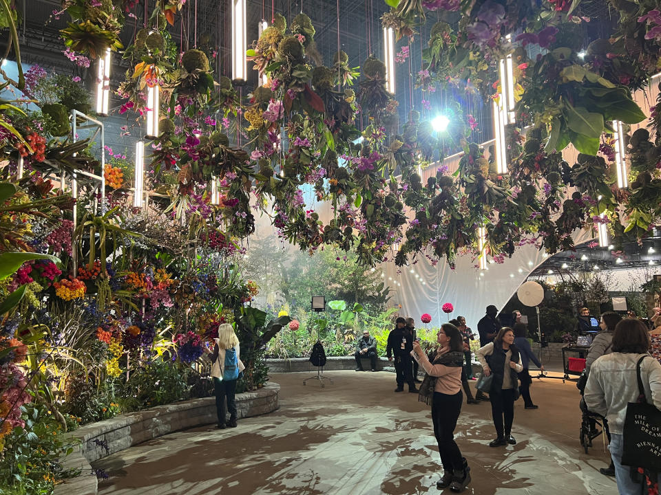 This March 3, 2023, image provided by Jessica Damiano shows "FLORASTRUCK," the orchid-adorned entrance garden at the 2023 Philadelphia Flower Show held at the Pennsylvania Convention Center in Philadelphia. (Jessica Damiano via AP)