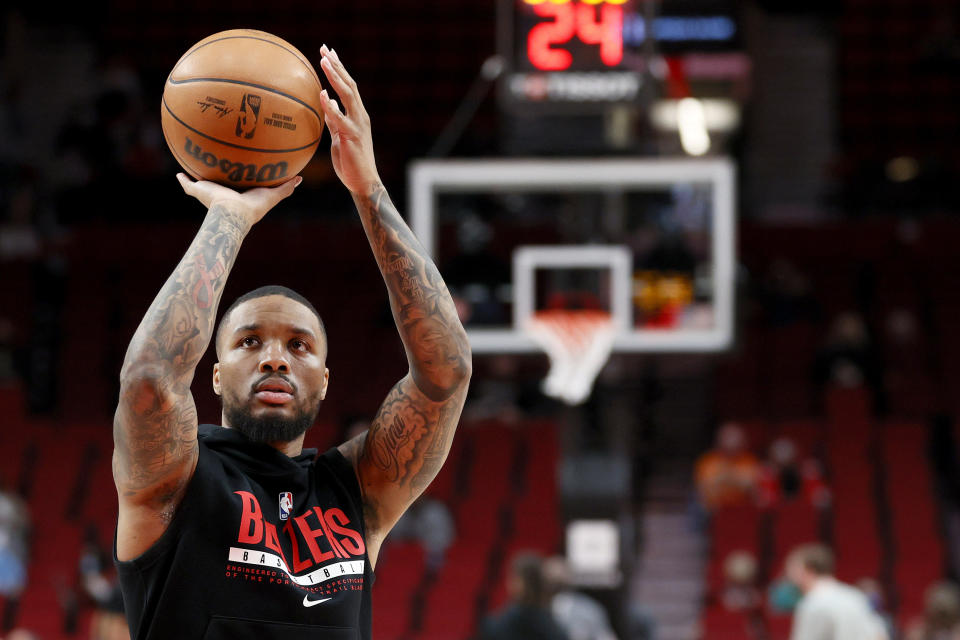 PORTLAND, OREGON - FEBRUARY 08: Damian Lillard #0 of the Portland Trail Blazers warms up before the game against the Orlando Magic at Moda Center on February 08, 2022 in Portland, Oregon. NOTE TO USER: User expressly acknowledges and agrees that, by downloading and/or using this photograph, User is consenting to the terms and conditions of the Getty Images License Agreement. (Photo by Steph Chambers/Getty Images)