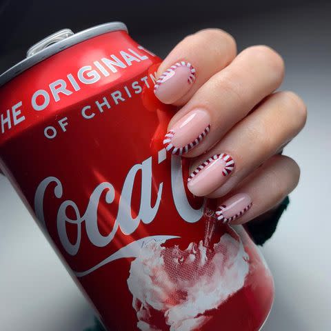 <p>Holidays are coming with these simple yet effective candy cane cuticles. </p><p><a href="https://www.instagram.com/p/CHyLhhQj2cP/" rel="nofollow noopener" target="_blank" data-ylk="slk:See the original post on Instagram" class="link ">See the original post on Instagram</a></p>