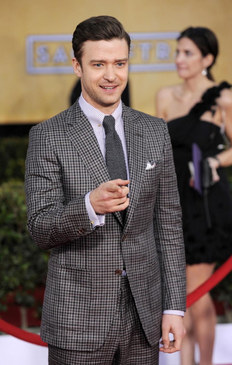 FILE - This Jan. 27, 2013 file photo shows actor-singer Justin Timberlake at the 19th Annual Screen Actors Guild Awards at the Shrine Auditorium in Los Angeles. The Recording Academy announced Wednesday, Jan. 30, that the pop star will perform at the awards show on Feb. 10. (Photo by Chris Pizzello/Invision/AP)