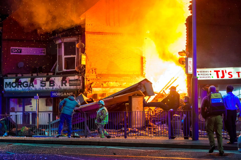 <em>The building that exploded is believed to be a convenience store (SWNS)</em>