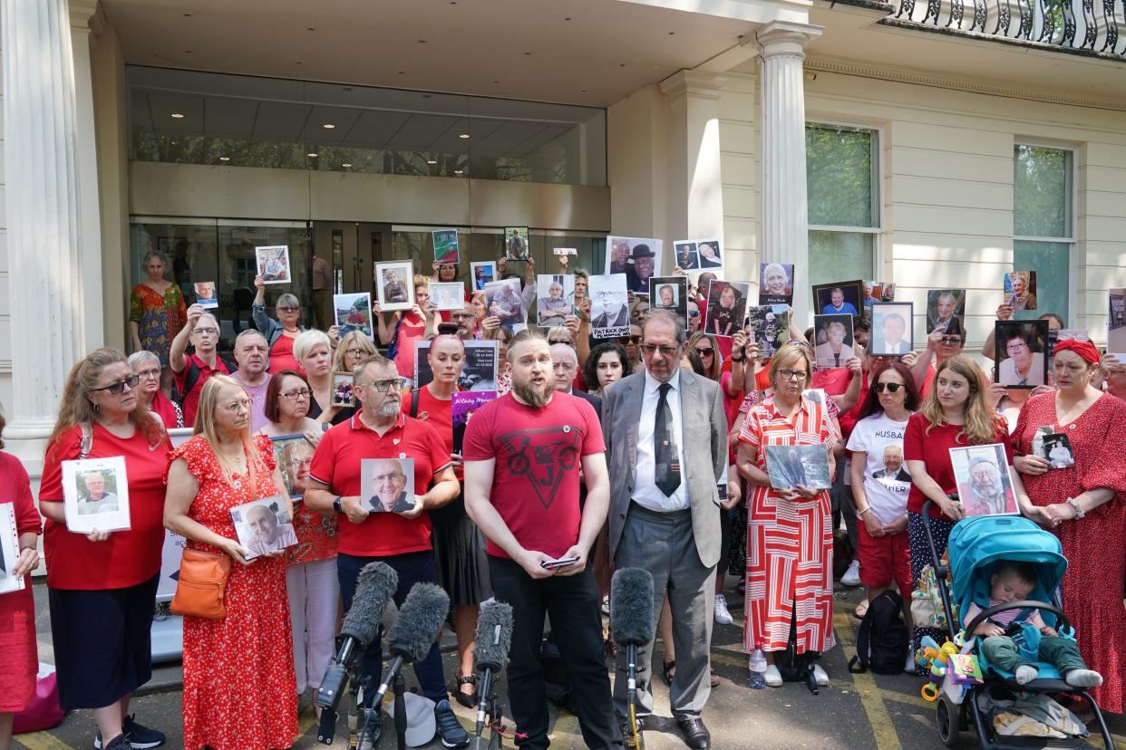 Matt Fowler (centre) co-founder of Covid Bereaved Families For Justice speaks to media outside the UK Covid-19 Inquiry at Dorland House in London (Lucy North/PA) (PA Wire)