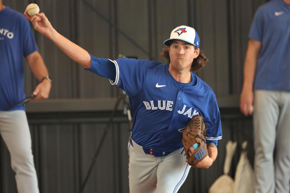 Blue Jays pitcher Kevin Gausman, shown in the new uniform during spring training, understands the business side of MLB.