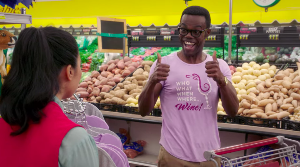 Chidi's shirt says, "Who what when where...wine"