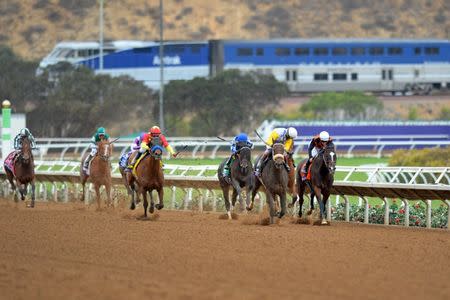 Nov 3, 2017; Del Mar, CA, USA; Forever Unbridled (one from right) leads Paradise Woods (right) and Elate (two from right) Abel Tasman (center) Stellar Wind (one from right) and Romantic Vision come down the final stretch in the ninth race during the 34th Breeders Cup world championships at Del Mar Thoroughbred Club. Mandatory Credit: Jake Roth-USA TODAY Sports