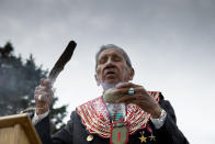 World War II D-Day veteran and Penobscot Elder from Maine, Charles Norman Shay performs a ritual of the 4 directions during a Native American ceremony at his memorial overlooking Omaha Beach in Saint-Laurent-sur-Mer, Normandy, France, Friday, June 5, 2020. Saturday's anniversary of D-Day will be one of the loneliest remembrances ever, as the coronavirus pandemic is keeping almost everyone away, from government leaders to frail veterans who might not get another chance for a final farewell to their unlucky comrades. (AP Photo/Virginia Mayo)