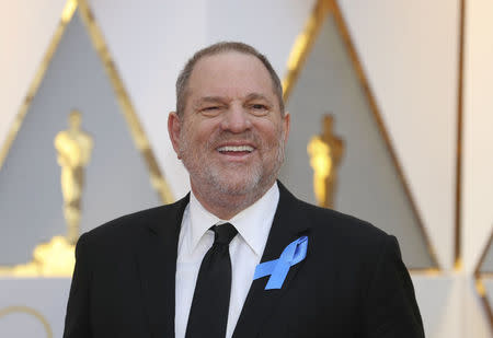 FILE PHOTO: Harvey Weinstein poses on the Red Carpet after arriving at the 89th Academy Awards in Hollywood, California, U.S., February 26, 2017. REUTERS/Mike Blake/File Photo