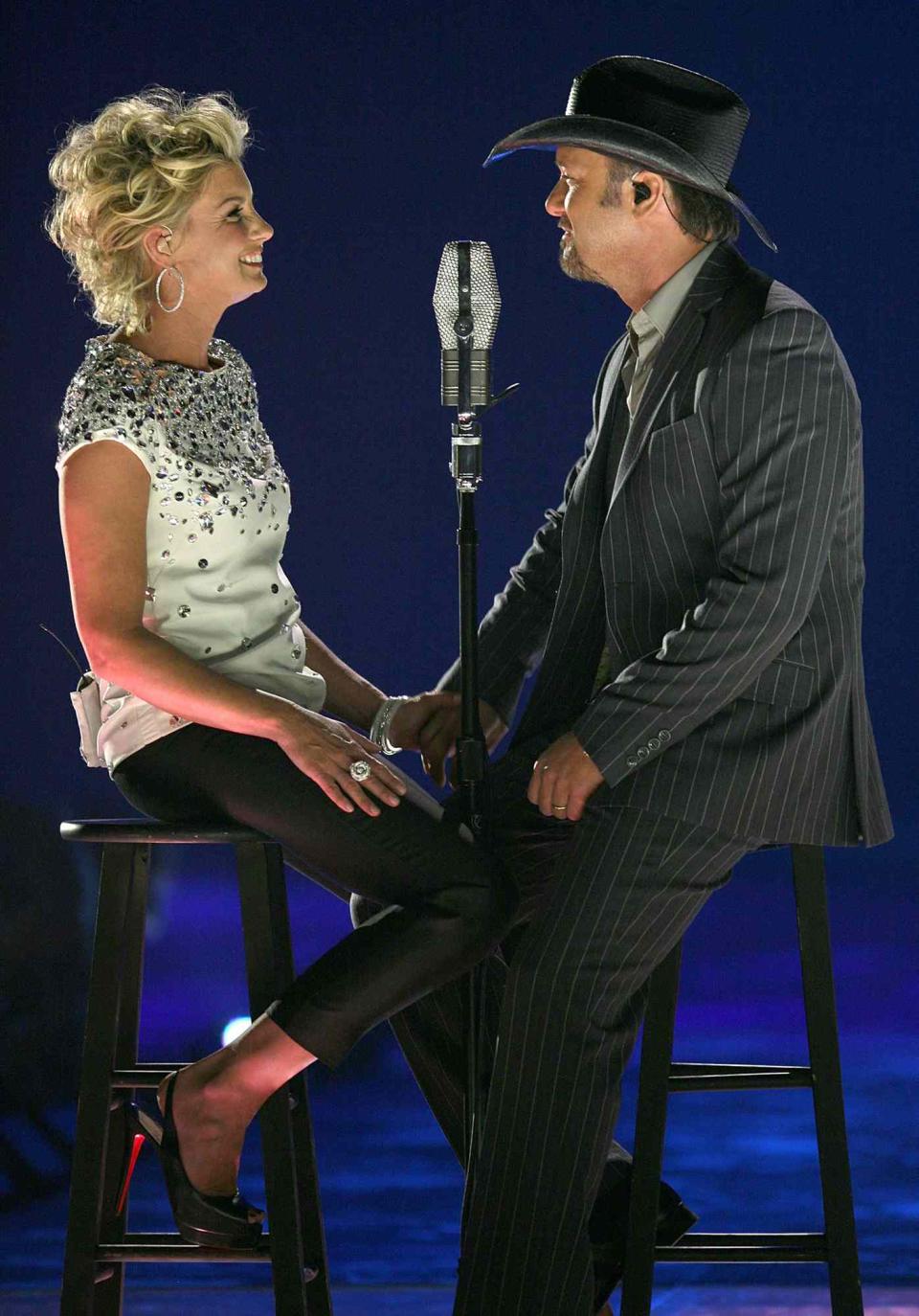 Faith Hill and Tim McGraw onstage during the 2008 CMT Music Awards at the Curb Events Center at Belmont University on April 14, 2008 in Nashville, Tennessee