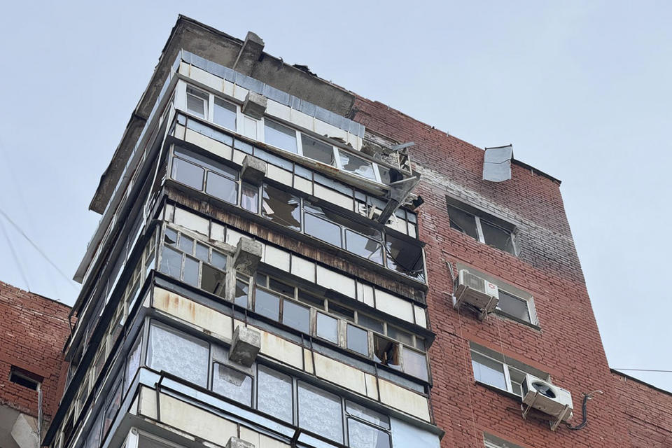 This photo released by Belgorod regional governor Vyacheslav Gladkov's Telegram channel on Thursday, March 21, 2024, shows a damaged building after shelling in Belgorod, Russia. (Belgorod Region Governor Vyacheslav Gladkov Telegram channel via AP)