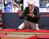 <p>The Marvel legend was <a rel="nofollow" href="https://www.yahoo.com/movies/excelsior-see-stan-lee-get-immortalized-hollywoods-chinese-theatre-225326175.html" data-ylk="slk:immortalized in Hollywood;elm:context_link;itc:0;sec:content-canvas;outcm:mb_qualified_link;_E:mb_qualified_link;ct:story;" class="link  yahoo-link">immortalized in Hollywood</a> as he left hand- and footprints at the iconic Grauman’s Chinese Theatre. Director Kevin Smith, a longtime fan of the man behind Spider-Man, the Fantastic Four, and many other superhero characters, emceed the event. (Photo: Willy Sanjuan/Invision/AP) </p>