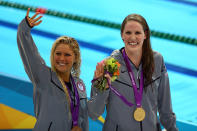 Gold medalist <a href="http://sports.yahoo.com/olympics/swimming/missy-franklin-1132902/" data-ylk="slk:Missy Franklin;elm:context_link;itc:0;sec:content-canvas" class="link ">Missy Franklin</a> and bronze medalist <a href="http://sports.yahoo.com/olympics/swimming/elizabeth-beisel-1133260/" data-ylk="slk:Elizabeth Beisel;elm:context_link;itc:0;sec:content-canvas" class="link ">Elizabeth Beisel</a> of the United States celebrate following the medal ceremony for the Women's 200m Backstroke Final on Day 7 of the London 2012 Olympic Games at the Aquatics Centre on August 3, 2012 in London, England. (Photo by Paul Gilham/Getty Images)