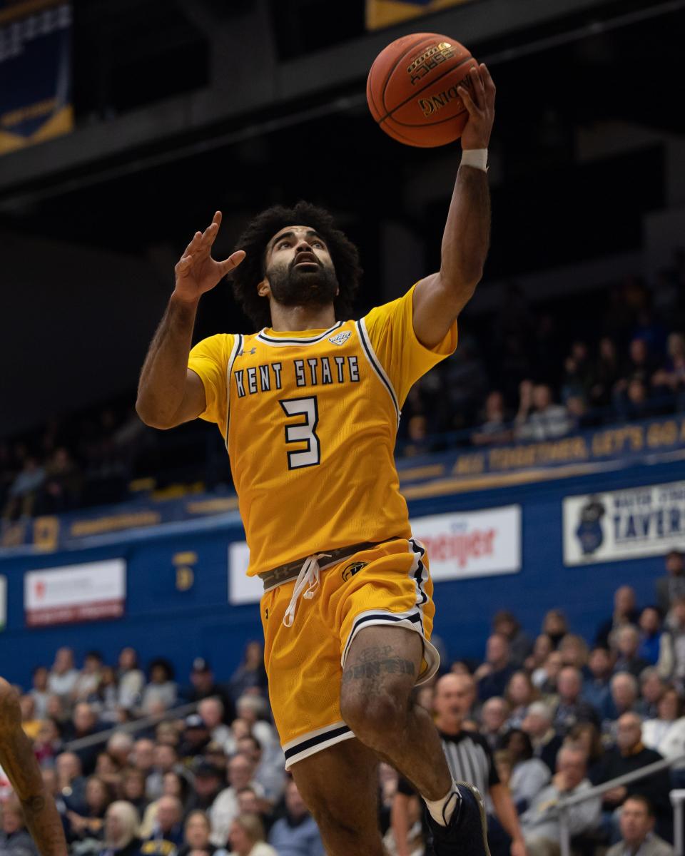 Kent State guard Sincere Carry puts in a lay-up off a breakaway during the first half of an NCAA basketball game against the Toledo Rockets, Tuesday, Jan. 10, 2023 at the Kent State M.A.C. Center.