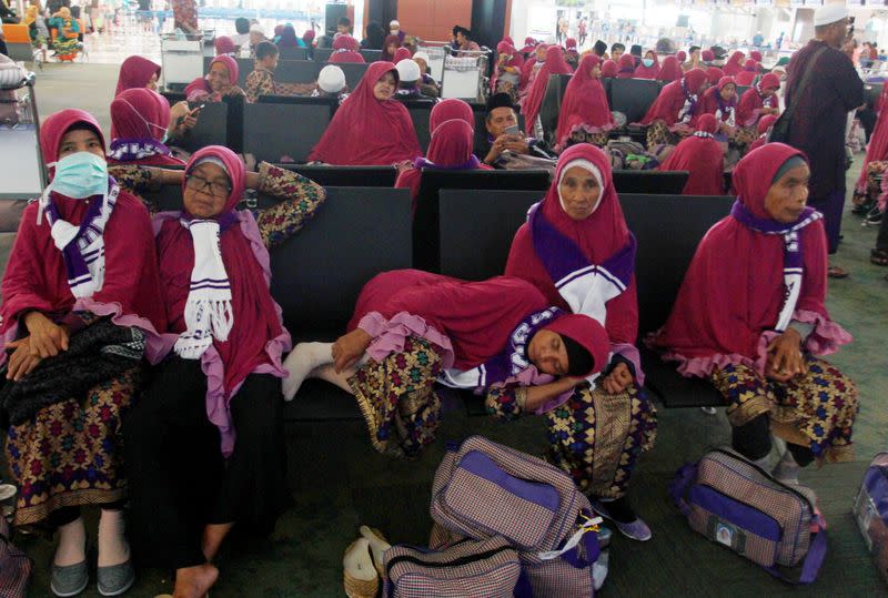 Umrah pilgrims sleep after the cancellation of the departure to Mecca at Soekarno Hatta International Airport