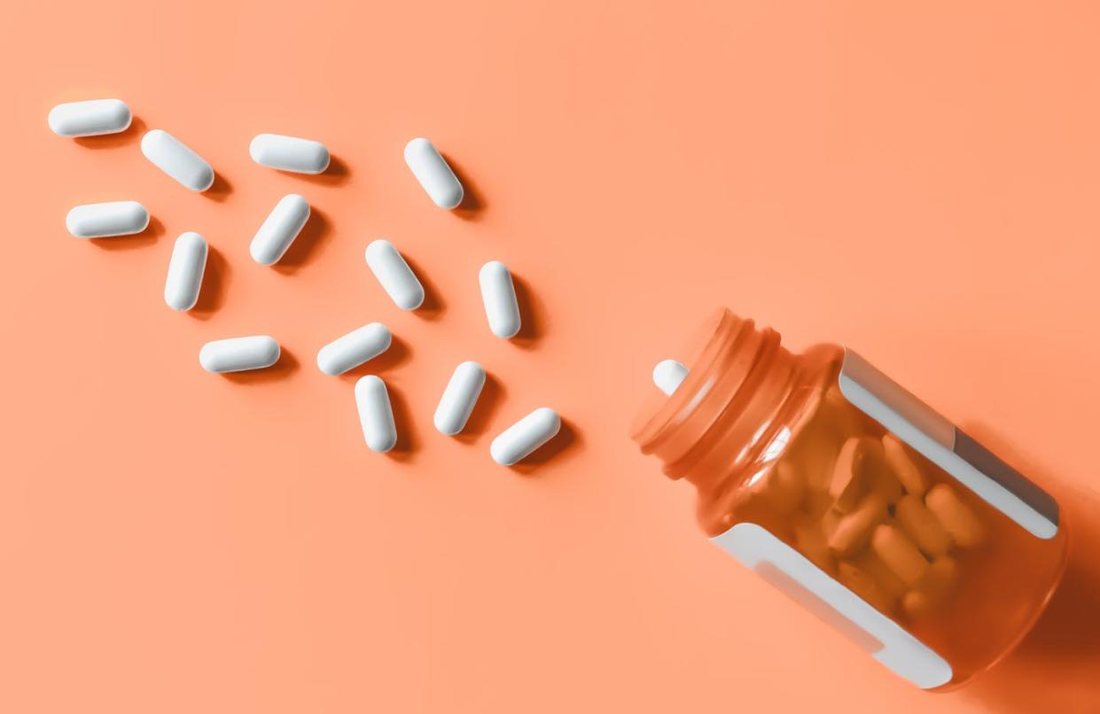 <span class="caption">As public figures and some in the media touted hydroxychloroquine, prescriptions skyrocketed. </span> <span class="attribution"><a class="link " href="https://www.gettyimages.com/detail/photo/white-pills-spilling-out-of-prescription-bottle-royalty-free-image/1161234835?adppopup=true&uiloc=thumbnail_same_series_adp&uiloc=thumbnail_same_series_adp" rel="nofollow noopener" target="_blank" data-ylk="slk:Grace Cary / Moment via Getty Images;elm:context_link;itc:0;sec:content-canvas"> Grace Cary / Moment via Getty Images</a></span>