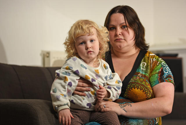 Mum 'hid away for two years' due to unusually large breasts