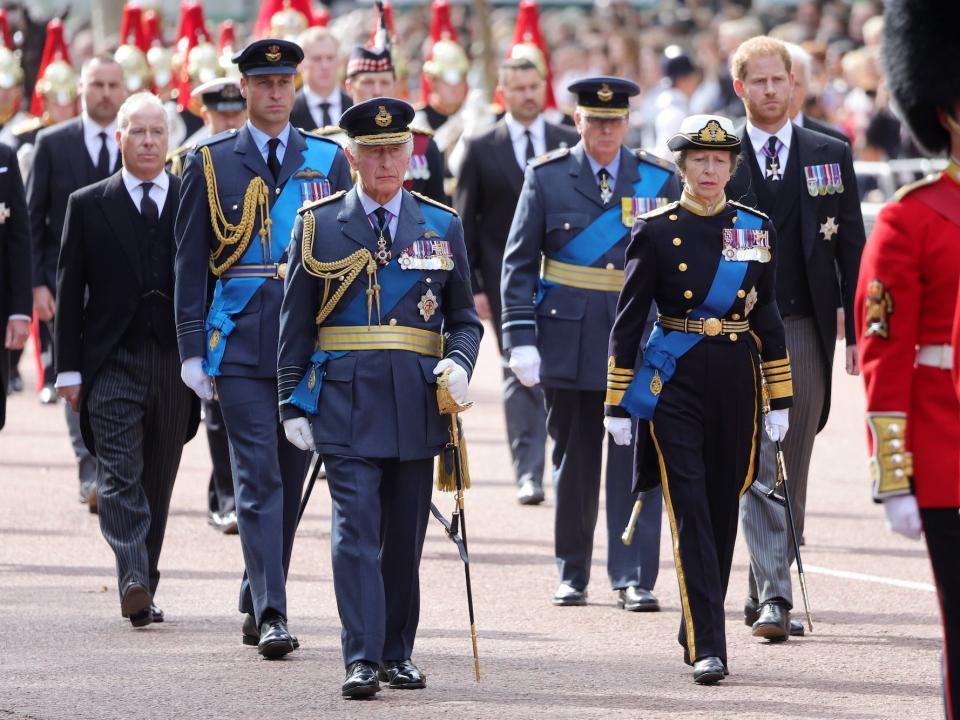 The royal family processes behind Queen Elizabeth's coffin.