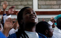 A Kenyan doctor reacts during a meeting to demand fulfilment of a 2013 agreement between their union and the government that would raise their pay and improve working conditions in Nairobi, Kenya December 5, 2016. REUTERS/Thomas Mukoya