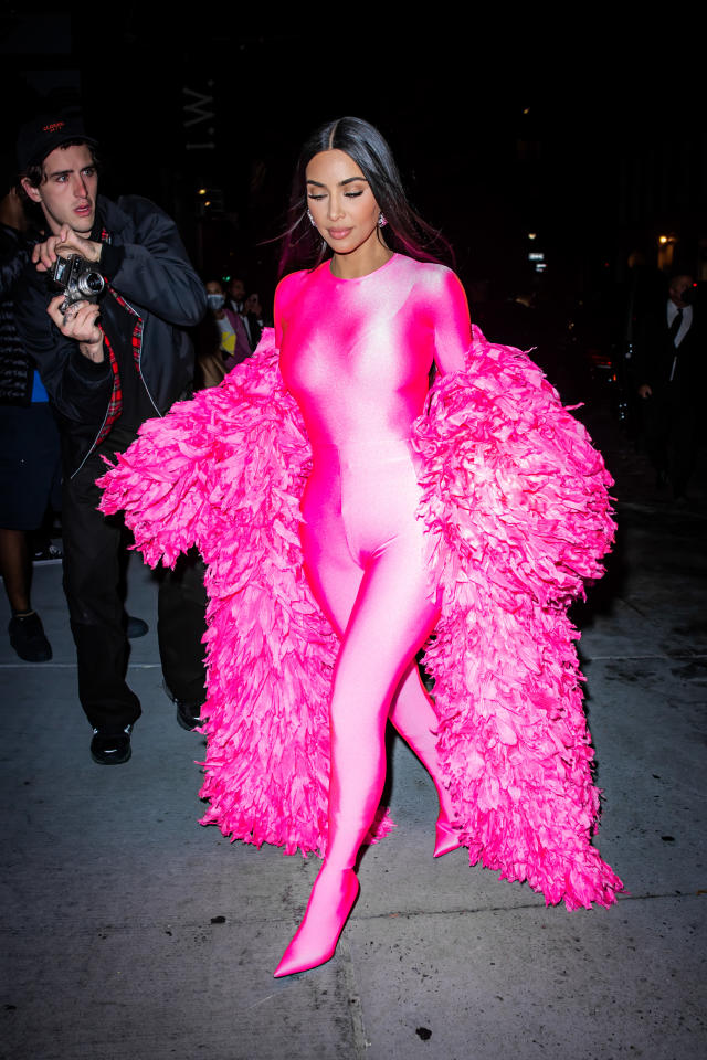 Kim Kardashian's Hot Pink Catsuit & Hidden Heels for 'SNL' Are