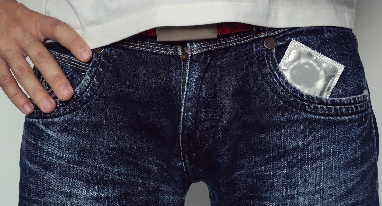 A man in blue jeans with a condom in his pants pocket. (Photo: Getty Images)