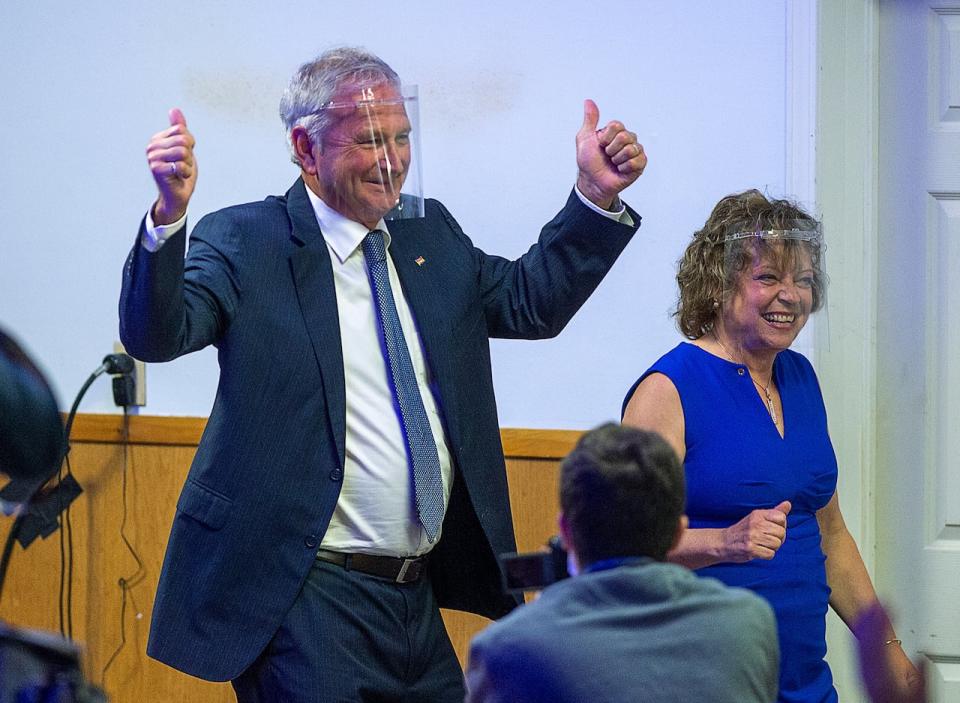 New Brunswick Premier Blaine Higgs, with his wife Marcia, arrives to address supporters after winning the New Brunswick provincial election in Quispamsis, N.B. on Monday, Sept. 14, 2020. The Progressive Conservative leader called the first provincial election during the COVID-19 pandemic and there was no door-to-door canvassing and no distribution of hand-held brochures.