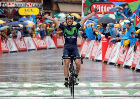 Cycling - Tour de France cycling race - The 146.5-km (91.5 miles) Stage 20 from Megeve to Morzine, France - 23/07/2016 - Movistar Team rider Jon Izaguirre Insausti of Spain wins on the finish line. REUTERS/Jean-Paul Pelissier