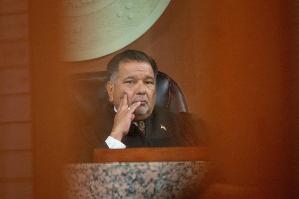 409th District Court Judge Sam Medrano listens during a scheduling hearing in the state of Texas' death penalty case against Patrick Crusius Jan. 18, 2024 at the Enrique Moreno County Courthouse in El Paso, Texas.