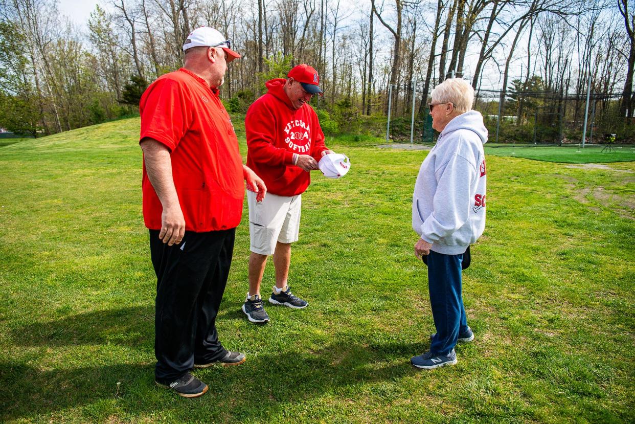 Ketcham softball coach Scott Satterlee speaks to the parents of former Ketcham student Melissa Bisaccia during an April 27, 2024 tournament held in their daughter's honor. Bisaccia died in 1997 of an epileptic seizure.