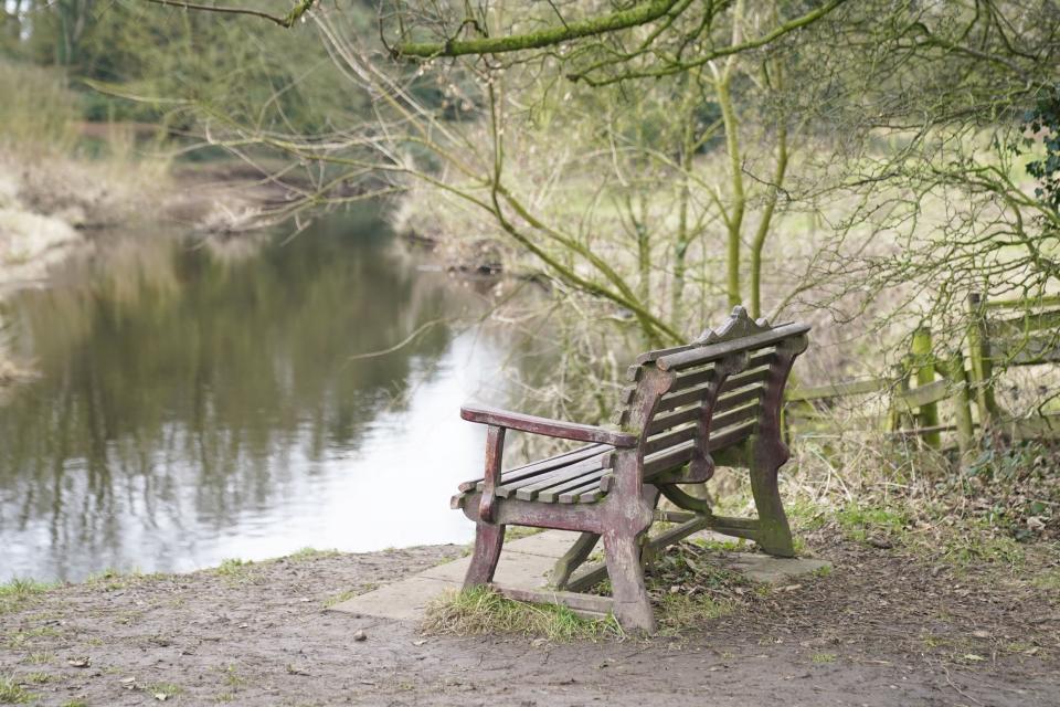 The bench where Nicola Bulley’s phone was found on the banks of the River Wyre (Danny Lawson/PA)