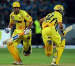 Chennai Super Kings batsmen Mahendra Singh Dhoni (L) and Ravindra Jadeja takes a run during the IPL Twenty20 cricket match between Pune Warriors India and Chennai Super Kings at The Subrata Roy Sahara Stadium in Pune on April 14, 2012. RESTRICTED TO EDITORIAL USE. MOBILE USE WITHIN NEWS PACKAGE AFP PHOTO/Indranil MUKHERJEE (Photo credit should read INDRANIL MUKHERJEE/AFP/Getty Images)