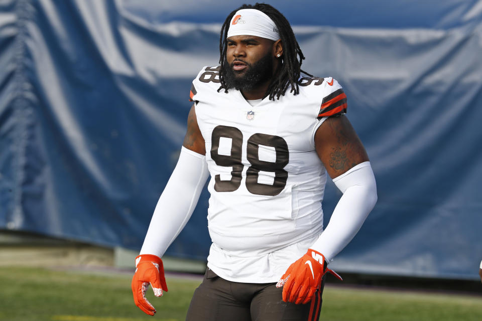 FILE - Cleveland Browns defensive tackle Sheldon Richardson (98) prepares for an NFL football game against the Tennessee Titans in Nashville, in this Sunday, Dec. 6, 2020, file photo. The Minnesota Vikings signed defensive tackle Sheldon Richardson before their minicamp began Tuesday, June 15, 2021, bringing back a proven interior pass rusher in the latest part of their offseason makeover. (AP Photo/Wade Payne, File)