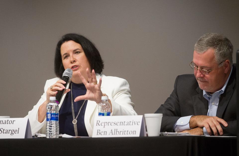 State Sen. Kelli Stargel answers a question during the Lakeland Chamber of Commerce 2018 Legislative Wrap-Up Breakfast. At right is  Ben Albritton, then a state representative but now a state senator.