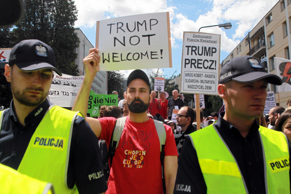 People protest against Trump ahead of his public speech in Warsaw.&nbsp;