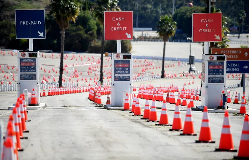 LOS ANGELES, CALIFORNIA FEBRUARY 19, 2021-An empty Dodger Stadium parking sits in the morning sun after the vaccination medicine was delayed due to the harsh weather across the the United States Friday. (Wally Skalij/Los Angeles Times)