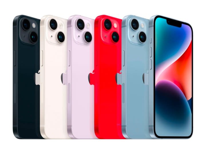 A lineup of Apple iPhone 14s in different colors against a white background.