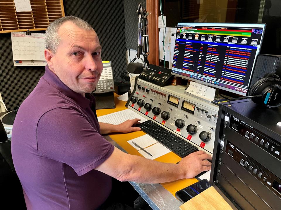 On-air announcer Eddie Manuel sits inside the studio of the WKXV radio station on Middlebrook Pike on Feb. 9. The station that focuses on gospel music and religious broadcasting has turned 70 years old this year.