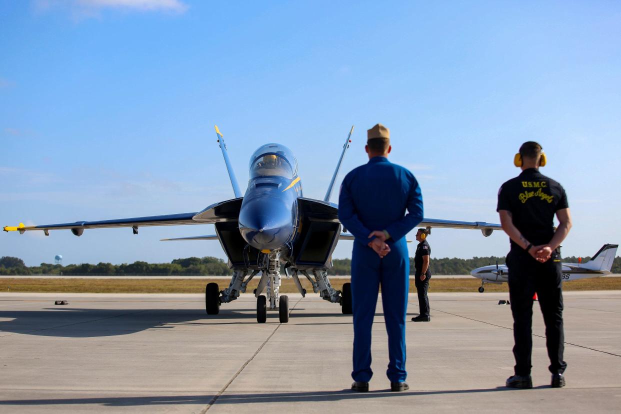 U.S. Navy Blue Angels Lt. Connor O'Donnell and Aviation Electrician's Mate (AE2) Sean Donoghue arrive in the No. 7 two-seat F/A-18F Super Hornet in Vero Beach Wednesday morning May 1, 2024, ahead of the weekend's air show at the Vero Beach Regional Airport.