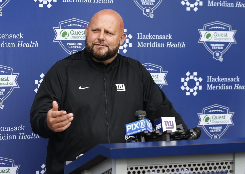 New York Giants head coach Brian Daboll answers questions from media at the NFL football team's rookie minicamp in East Rutherford, N.J., Friday, May 13, 2022. (AP Photo/Noah K. Murray)